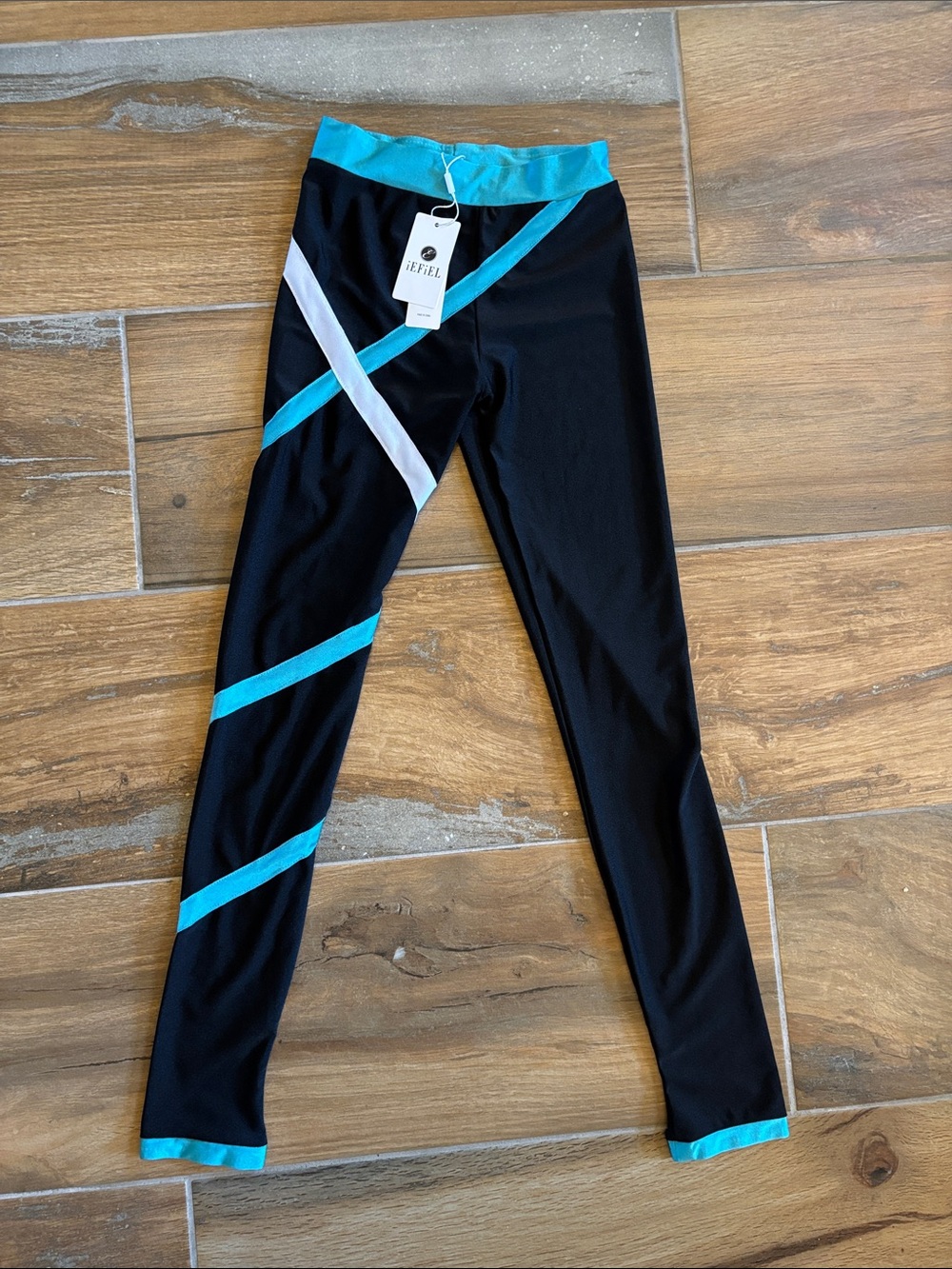 Kids Black Leggings with Teal & White Accent Stripes